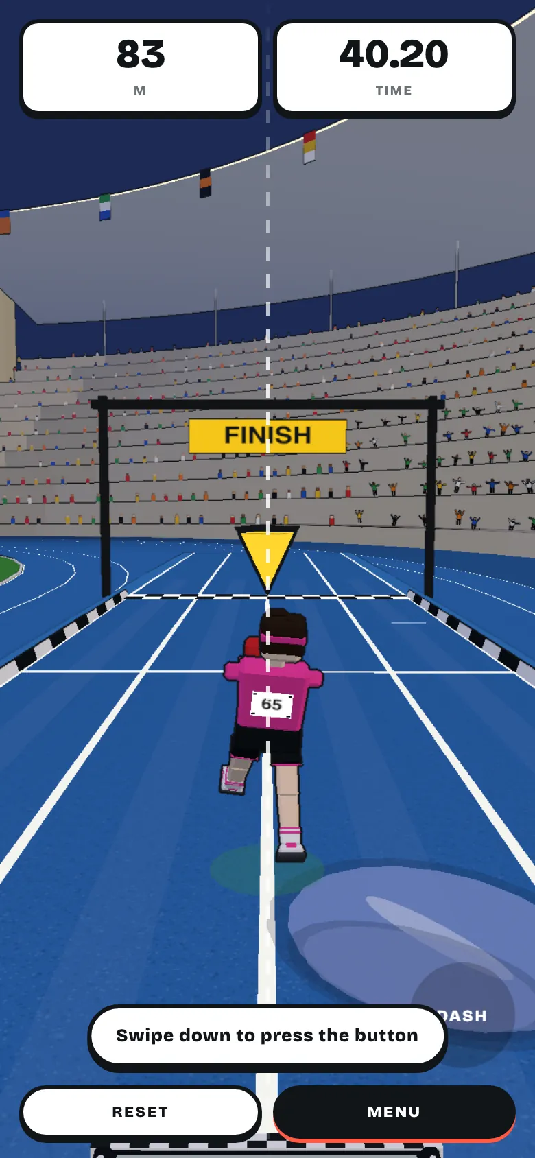 A runner approaching the finish gate at 83 metres on a blue stadium track
